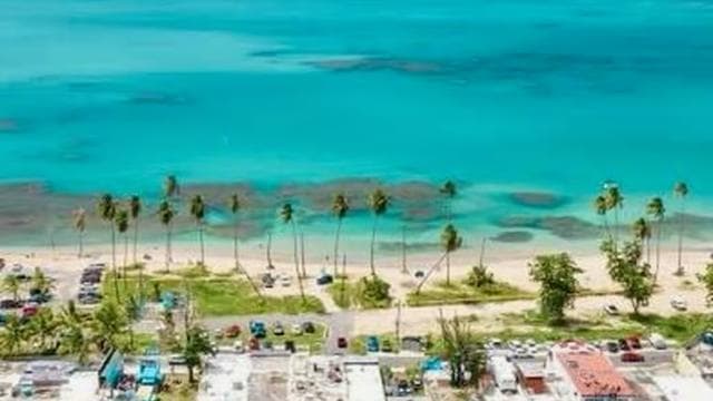 San Juan: Rainforest Waterslides & Beach Tour with Transport