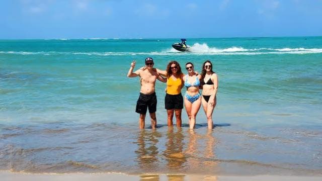 From San Juan: Rainforest River, Luquillo Beach, & Cave Tour