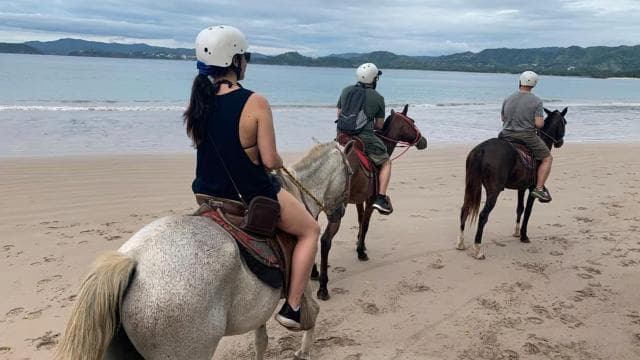Horseback riding on the beach