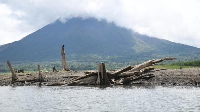 Enjoy the best Volcano view at our Kayak tour on Lake Arenal
