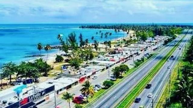 San Juan: Rainforest Waterslides & Beach Tour with Transport