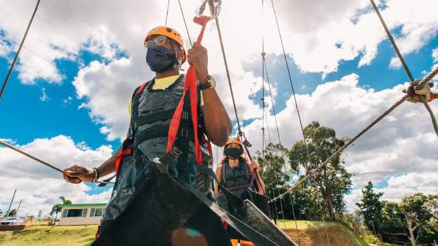 From San Juan: Zipline & Toro Bike Tour with Transportation