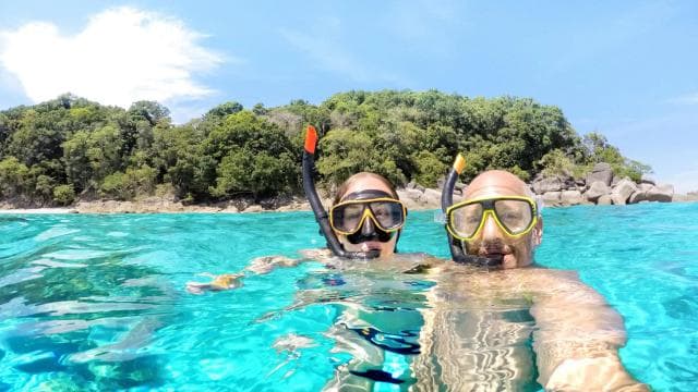 From Fajardo: Sunset Boat and Snorkeling with Lunch and Open Bar