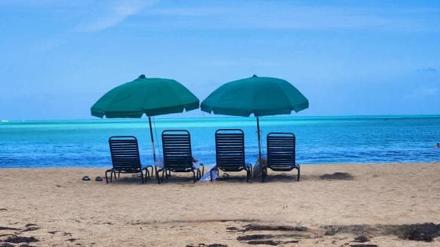 From San Juan: Rainforest River, Luquillo Beach, & Cave Tour