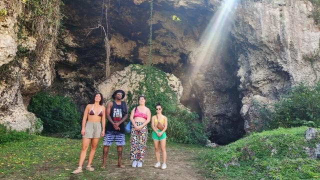 From San Juan: Rainforest River, Luquillo Beach, & Cave Tour