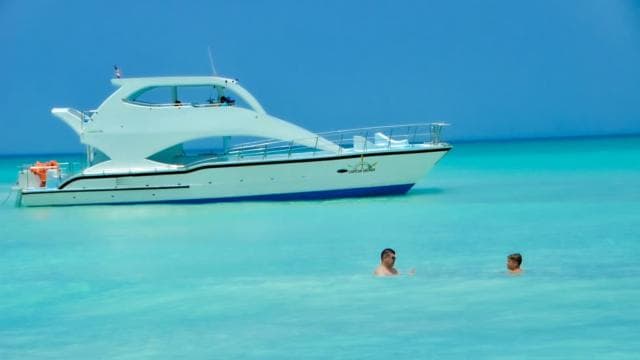 From Punta Cana: Saona and Mano Juan Day Trip by Catamaran