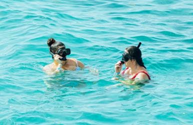 Punta Cana Bavaro: Private catamaran boat with snorkeling, open bar, and sailing