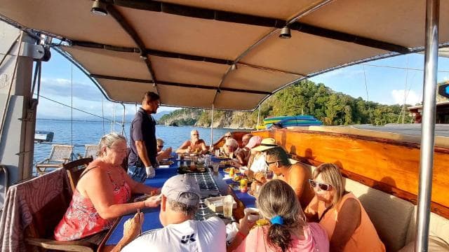Quepos: Wooden Sail Yacht Cruise with Watersports and Food