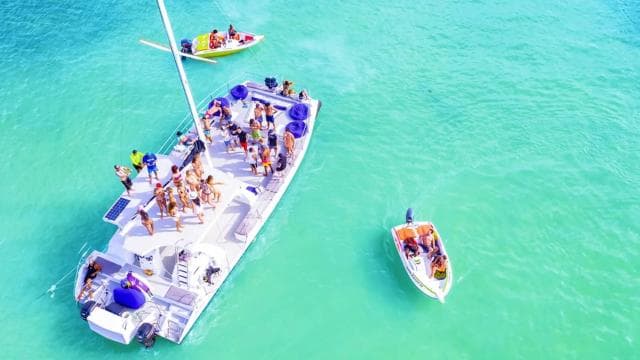 Punta Cana Area: Party Cruise with Parasailing and Open Bar