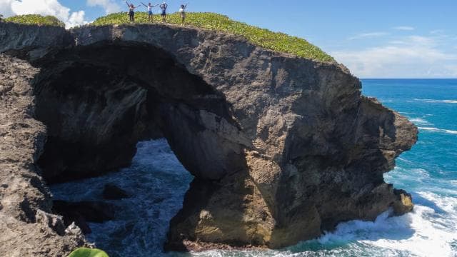 From San Juan: Cave of the Taino Indian Trek and Beach Tour